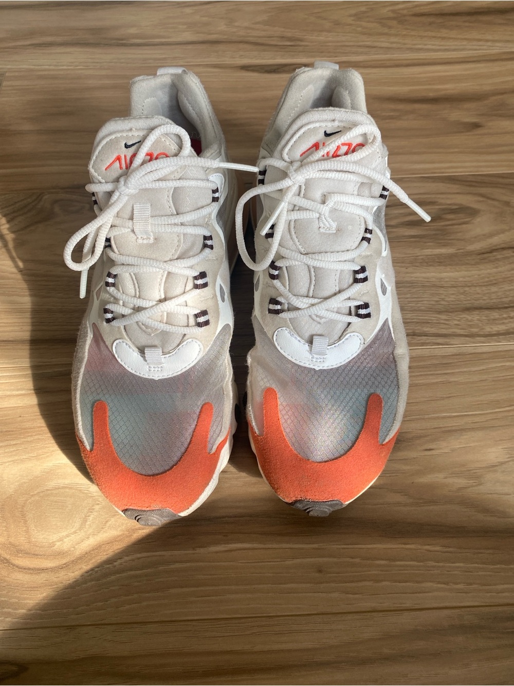 Nike Women’s White and Orange Flame-Accent Sneakers